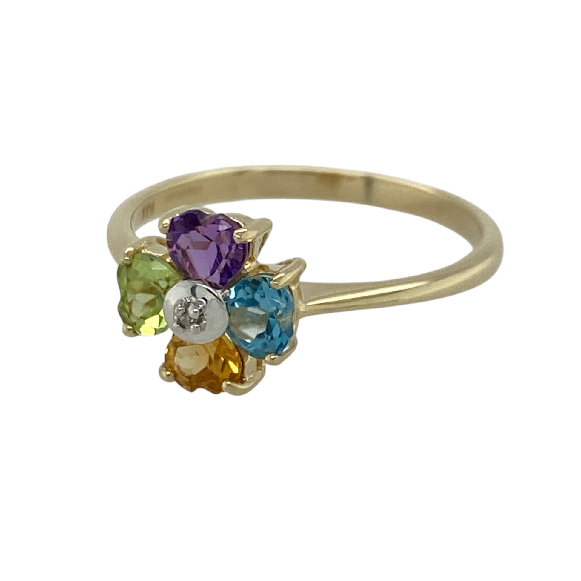 This pre-owned 9ct yellow gold diamond and gemstone flower ring is a colourful floral design, featuring a mix of gemstones forming the petals with a diamond at the centre.

Design: Featuring a flower-shaped design with colourful gemstone petals and a small diamond set in the centre, this ring is finished in warm 9ct yellow gold.
Material: Made from 9-carat yellow gold.
Gemstone Detail: Set with amethyst, blue topaz, citrine and peridot stones forming the flower petals, with a small diamond in the centre.