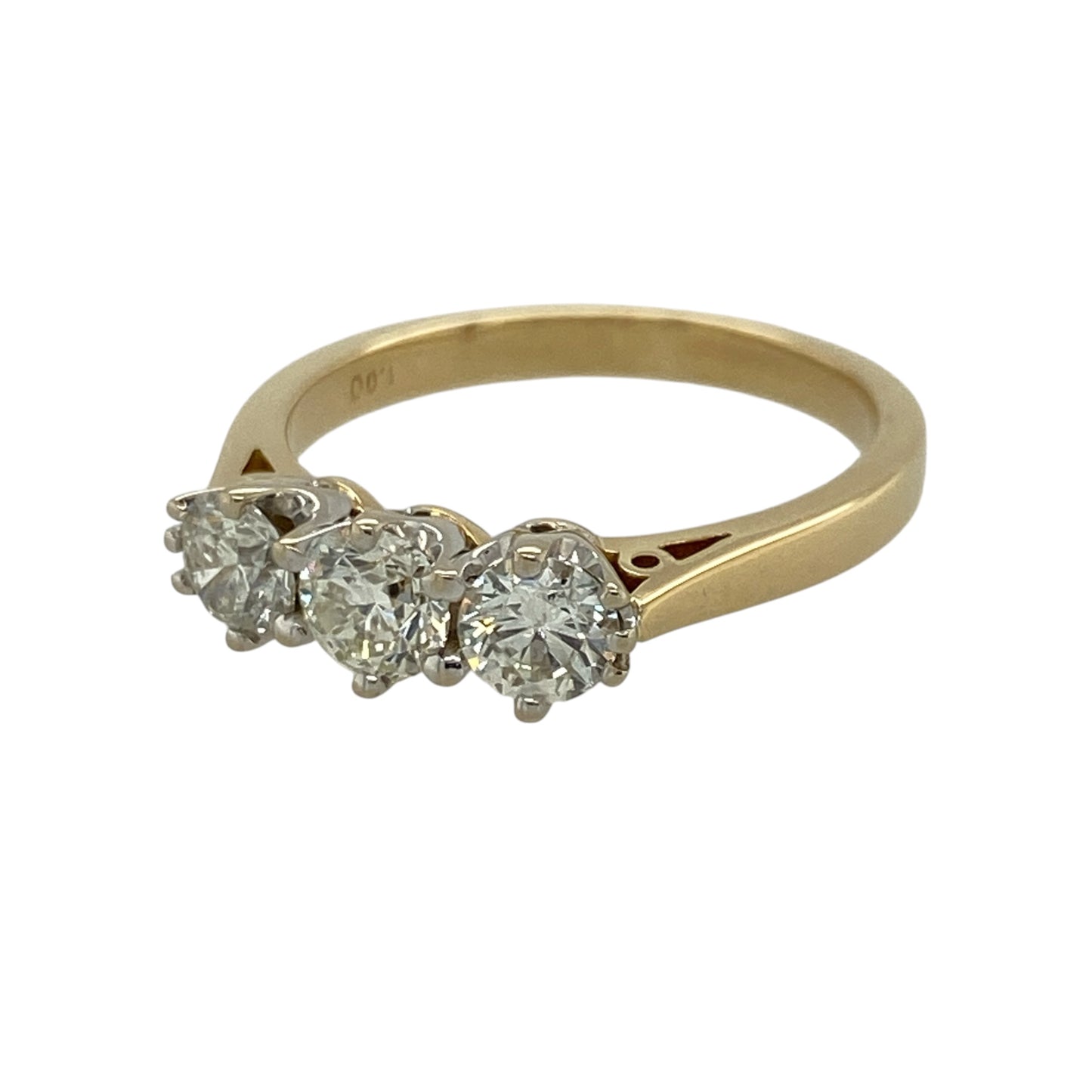 This pre-owned 18ct yellow gold diamond trilogy ring is a timeless three-stone design, featuring approximately 1ct of diamond content in total.

Design: Featuring three diamonds set alongside one another in a classic trilogy setting, this ring is finished in warm 18ct yellow gold.
Material: Made from 18-carat yellow gold.
Gemstone Detail: Three diamonds with approximately 1ct of diamond content set in total.
Ring Detail: Classic three-stone trilogy design.