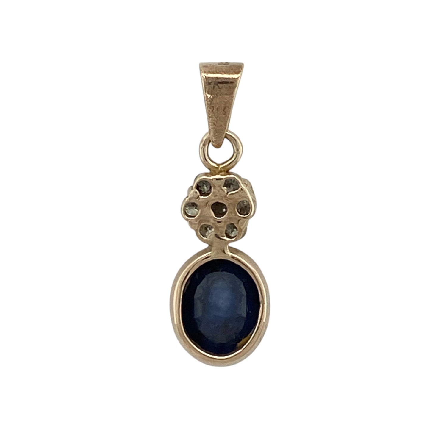 This pre-owned 9ct yellow gold diamond and sapphire pendant is a classic gemstone design, featuring a large oval sapphire with a diamond cluster above.

Design: Featuring an oval sapphire with a decorative diamond cluster set above, this pendant combines rich blue tones with the warm finish of 9ct yellow gold.
Material: Made from 9-carat yellow gold.
Gemstone Detail: Oval sapphire measuring approximately 10mm by 8mm with a diamond cluster set above.
Pendant Detail: Bail measures approximately 6mm by 4mm.