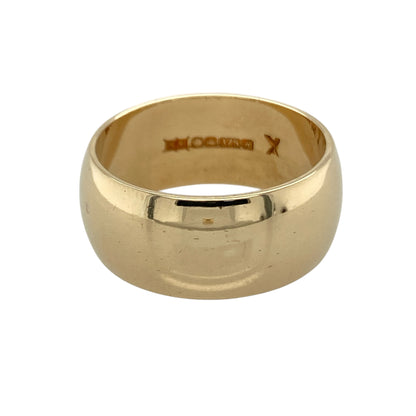 This pre-owned 9ct yellow gold wedding band ring is a substantial classic design, featuring a bold 10mm wide profile.

Design: Featuring a traditional wide wedding band design, this ring has a substantial profile finished in warm 9ct yellow gold.
Material: Made from 9-carat yellow gold.
Ring Detail: Band measures approximately 10mm wide.
Size &amp; Weight: Ring size U to V. Total weight 9.50 grams.