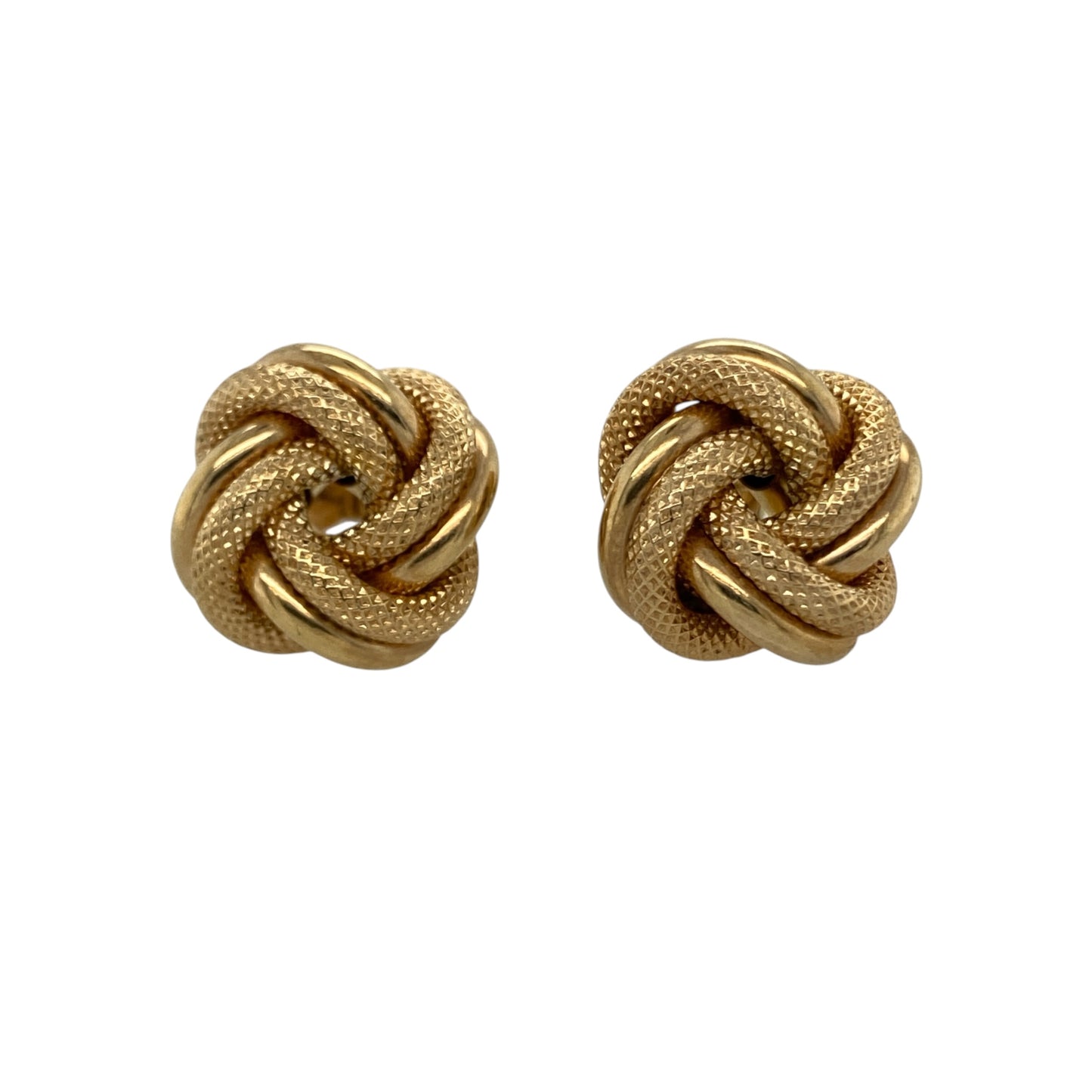 These pre-owned 9ct yellow gold patterned knot stud earrings are a classic decorative design, featuring an interwoven knot-style pattern.

Design: Featuring a patterned knot design, these stud earrings have an interwoven decorative finish in warm 9ct yellow gold.
Material: Made from 9-carat yellow gold.
Earring Detail: Knot stud earrings measuring approximately 14mm.
Size & Weight: Total weight 2.80 grams.