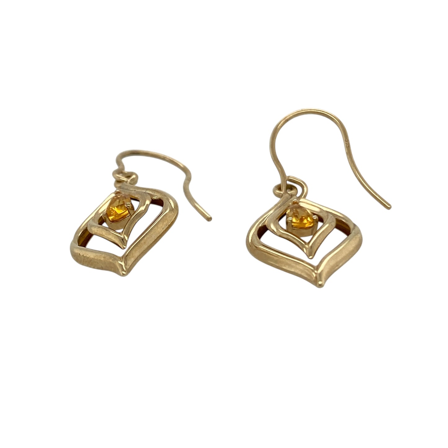 These pre-owned 9ct yellow gold citrine marquise-shaped drop earrings are a colourful gemstone design, featuring teardrop citrine stones in warm yellow gold.

Design: Featuring a marquise-shaped drop design with teardrop citrine stones, these earrings combine warm golden tones with 9ct yellow gold.
Material: Made from 9-carat yellow gold.
Gemstone Detail: Teardrop citrine stones each measuring approximately 5mm by 3mm.
Earring Detail: Marquise-shaped drop earring design.