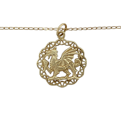 This pre-owned 9ct yellow gold Welsh Dragon Celtic Knot pendant necklace is a distinctive Welsh-inspired design, combining two traditional motifs.

Design: Featuring a Welsh Dragon surrounded by Celtic Knot detailing, this pendant is finished in warm 9ct yellow gold and suspended from a fine curb chain.
Material: Made from 9-carat yellow gold.
Pendant Detail: Welsh Dragon and Celtic Knot pendant measuring approximately 2.5cm long including the bail.