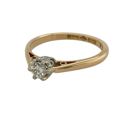 This pre-owned 18ct yellow gold diamond solitaire ring is a timeless design, featuring a brilliant cut diamond as the centrepiece.

Design: Featuring a classic solitaire setting, this ring showcases a single brilliant cut diamond complemented by the warm finish of 18ct yellow gold.
Material: Made from 18-carat yellow gold.
Gemstone Detail: Brilliant cut diamond measuring approximately 0.20ct.
Ring Detail: Classic solitaire ring design.
Size & Weight: Ring size J to K. Total weight 2.40 grams.