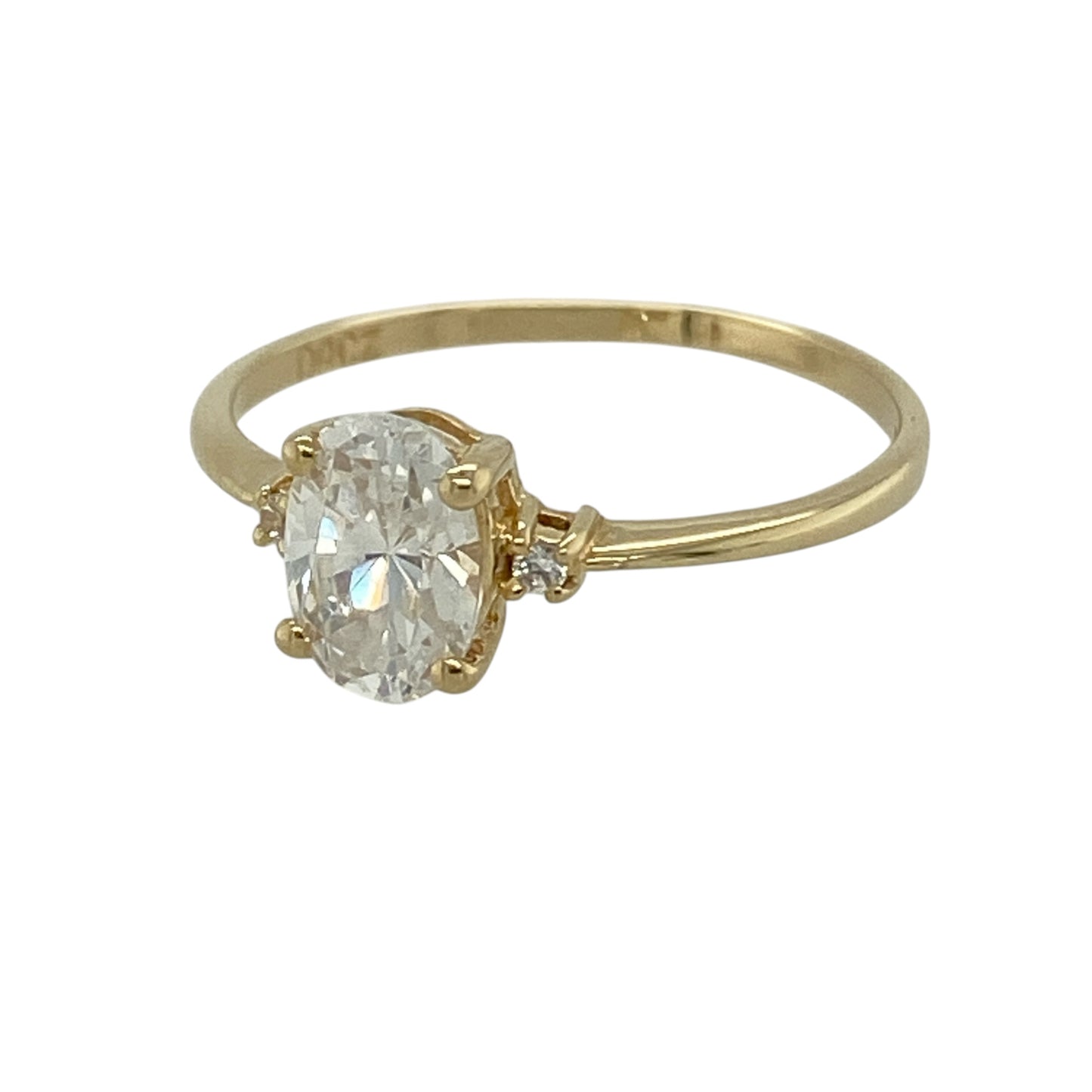 This pre-owned 14ct yellow gold cubic zirconia solitaire ring is a classic stone-set design, featuring an oval centre stone with smaller cubic zirconia detailing on either side.

Design: Featuring an oval cubic zirconia centre stone with a smaller round stone set on either side, this ring has a classic design finished in warm 14ct yellow gold.
Material: Made from 14-carat yellow gold.