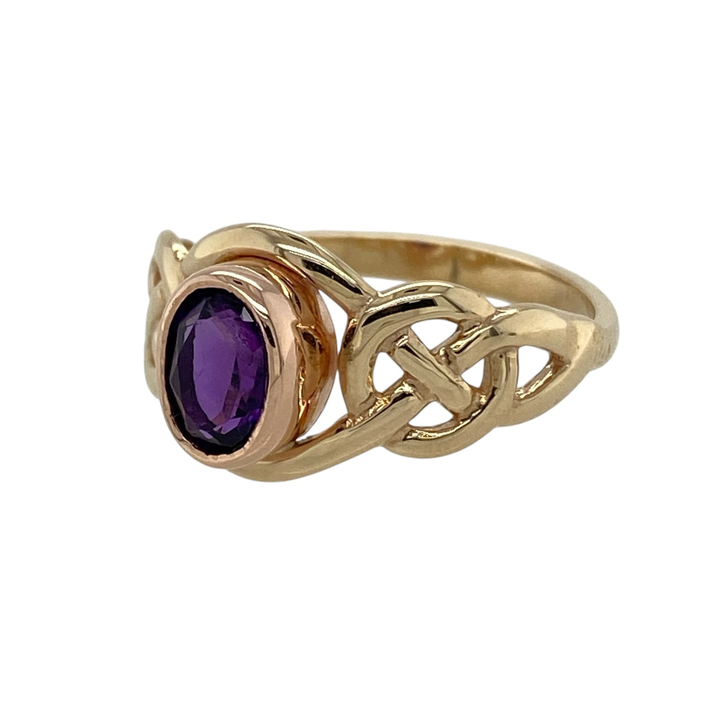 Beautifully combining Welsh-inspired design with elegant gemstone detail, this pre-owned 9ct yellow and rose gold amethyst set Clogau Celtic Knot birthstone ring is a meaningful and distinctive piece. Featuring the iconic Celtic knot motif and a vibrant amethyst, it celebrates both heritage and the February birthstone in timeless style.

Design: The ring showcases an elegant Celtic knot design, symbolising eternity, unity, and everlasting love.