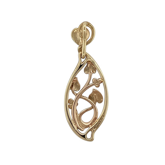 This pre-owned 9ct yellow and rose gold Clogau Tree of Life marquise-shaped pendant is a distinctive two-tone design, featuring Clogau’s iconic Tree of Life detailing.

Design: Featuring a marquise-shaped design with Clogau’s Tree of Life detailing, this pendant combines warm yellow gold with contrasting rose gold accents.
Material: Made from 9-carat yellow and rose gold.
Pendant Detail: Tree of Life marquise-shaped pendant with a bail measuring approximately 8mm by 3mm.