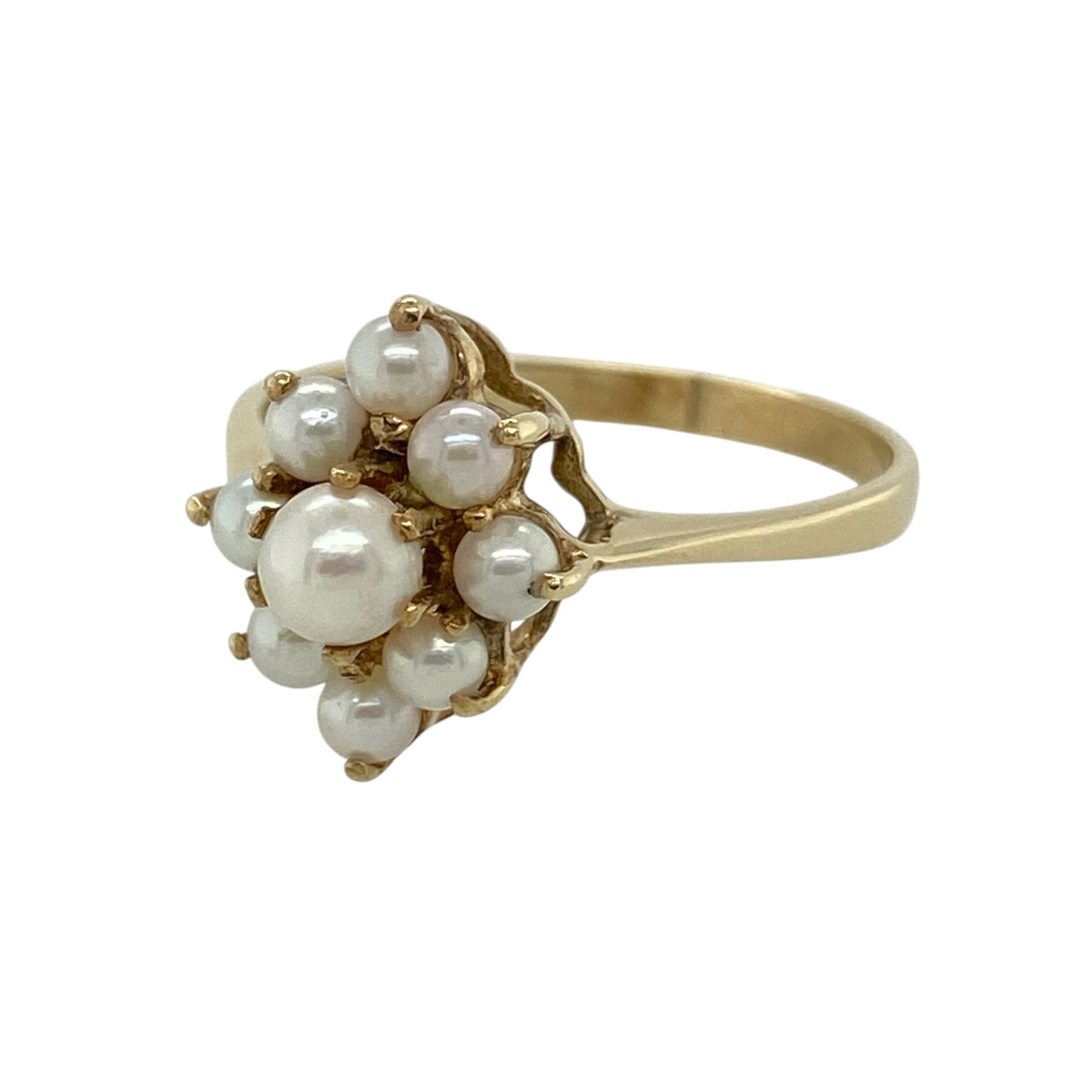 This pre-owned 9ct yellow gold pearl marquise-shaped cluster ring is a classic decorative design, featuring pearls arranged in an elongated cluster setting.

Design: Featuring a marquise-shaped cluster design set with pearls, this ring has an elegant elongated profile finished in warm 9ct yellow gold.
Material: Made from 9-carat yellow gold.
Gemstone Detail: Set with pearls in a marquise-shaped cluster arrangement.
Ring Detail: Front of the ring measures approximately 14mm high.