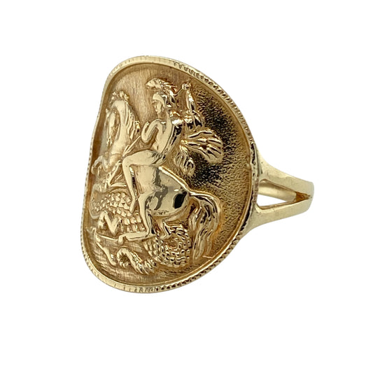 This pre-owned 9ct yellow gold George and the Dragon coin-style ring is a distinctive traditional design, featuring the iconic St George and the Dragon motif.

Design: Featuring a coin-style front depicting St George and the Dragon, this ring has a bold traditional design finished in warm 9ct yellow gold.
Material: Made from 9-carat yellow gold.
Ring Detail: Coin-style front featuring the St George and the Dragon design and measuring approximately 19mm high.