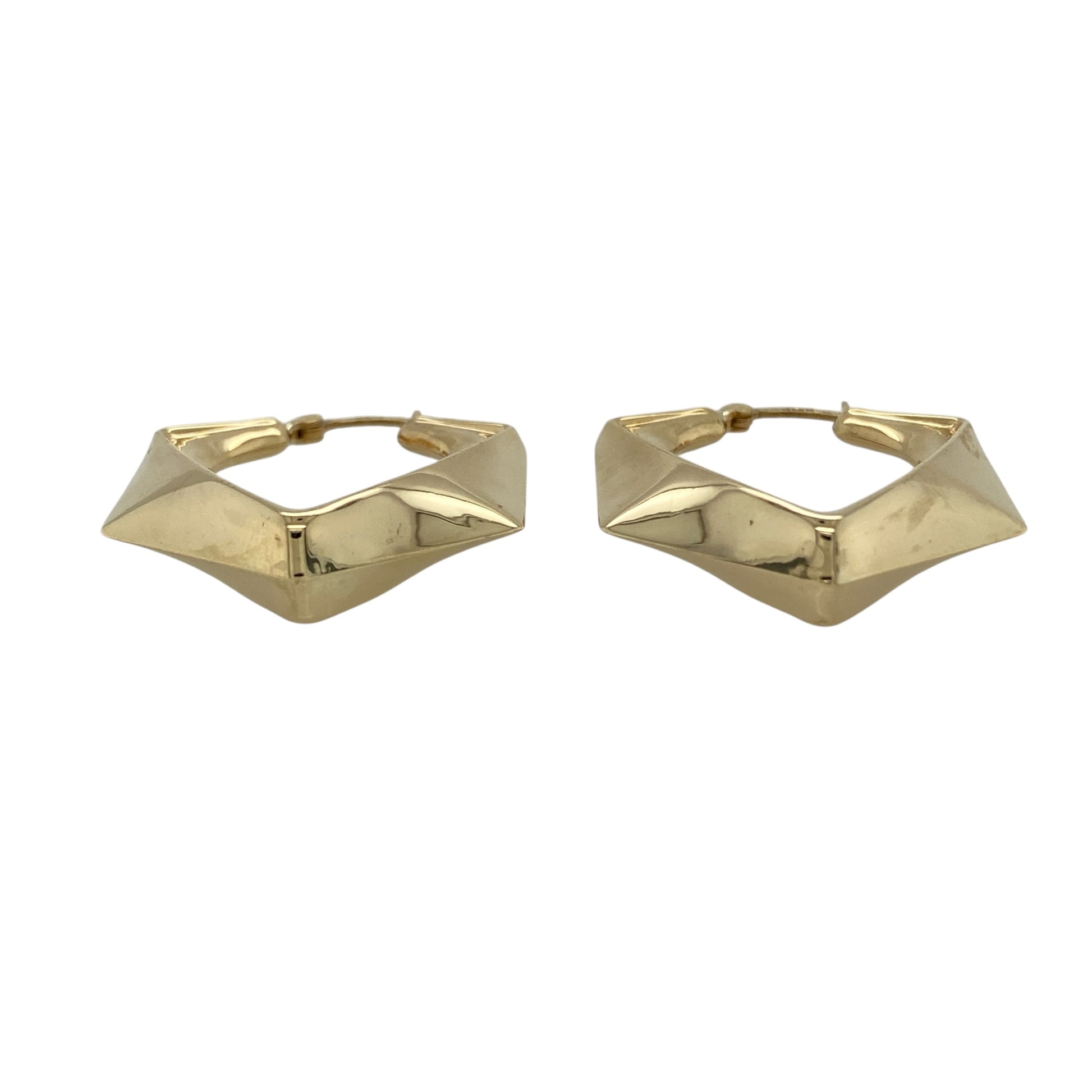 These pre-owned 9ct yellow gold hexagon chunky creole earrings are a bold geometric design, featuring a distinctive angular shape.

Design: Featuring a chunky hexagon-shaped creole design, these earrings have a bold geometric profile finished in warm 9ct yellow gold.
Material: Made from 9-carat yellow gold.
Earring Detail: Chunky hexagon creole earring design.
Size & Weight: Total weight 3.60 grams.