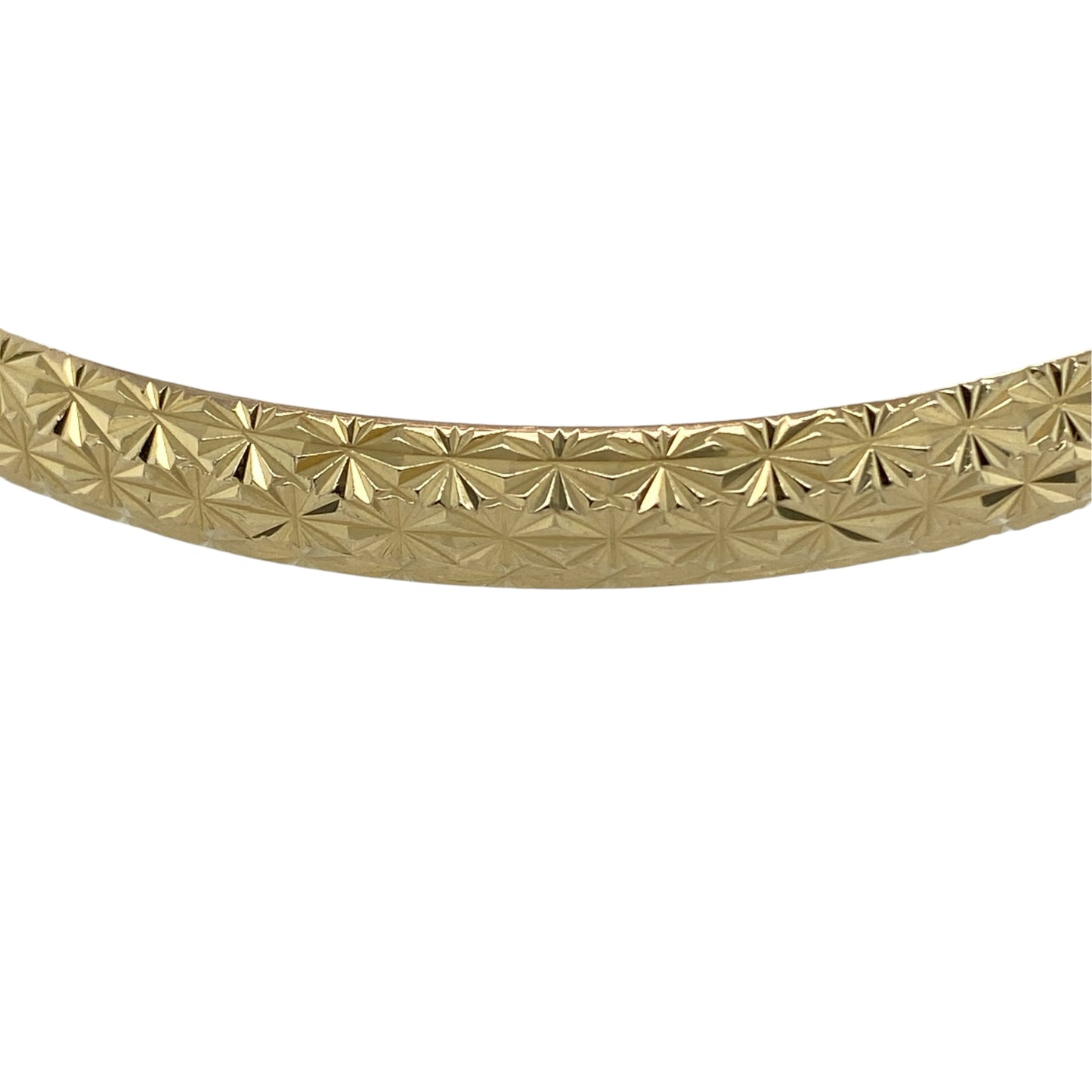 This pre-owned 9ct yellow gold patterned bangle is a classic decorative design, featuring patterned detailing throughout.

Design: Featuring a patterned design, this bangle has a decorative finish in warm 9ct yellow gold.
Material: Made from 9-carat yellow gold.
Bangle Detail: Bangle measures approximately 6mm wide with a diameter of approximately 6.5cm.
Size & Weight: Total weight 6.80 grams.