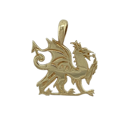 This pre-owned 9ct yellow gold Welsh Dragon pendant is a distinctive Welsh-inspired design, featuring the traditional dragon motif.

Design: Featuring a detailed Welsh Dragon design, this pendant is finished in warm 9ct yellow gold.
Material: Made from 9-carat yellow gold.
Pendant Detail: Welsh Dragon pendant with a bail measuring approximately 4mm by 2mm.
Size & Weight: Total weight 1.70 grams.