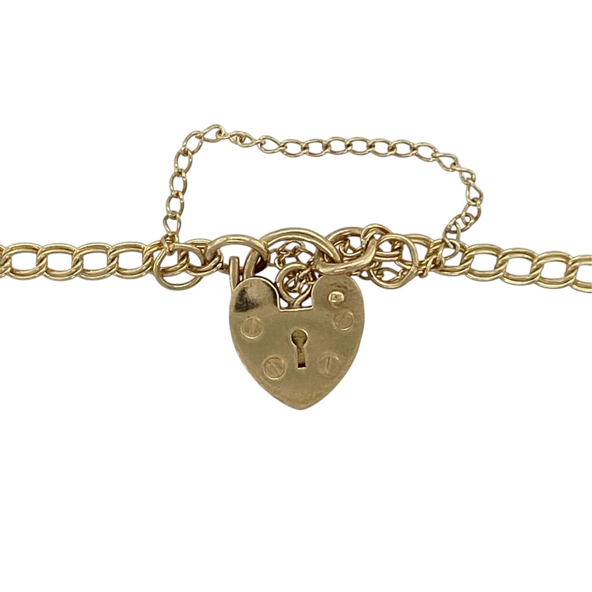This pre-owned 9ct yellow and rose gold Clogau Cariad double curb bracelet is a distinctive two-tone design, featuring a heart padlock fastening and safety chain.

Design: Featuring a double curb link design from Clogau’s Cariad collection, this bracelet combines warm yellow gold with contrasting rose gold detailing.
Material: Made from 9-carat yellow and rose gold.
Bracelet Detail: Double curb bracelet with a heart padlock fastening and safety chain.