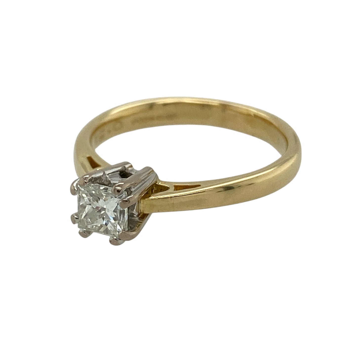 This pre-owned 18ct yellow gold diamond solitaire ring is a timeless design, featuring a claw-set princess cut diamond of approximately 0.51ct.

Design: Featuring a classic solitaire design with a claw-set princess cut diamond, this ring is finished in warm 18ct yellow gold.
Material: Made from 18-carat yellow gold.
Gemstone Detail: Princess cut diamond measuring approximately 0.51ct, with approximate VS2 clarity and G–H colour.
Ring Detail: Classic claw-set solitaire ring design.