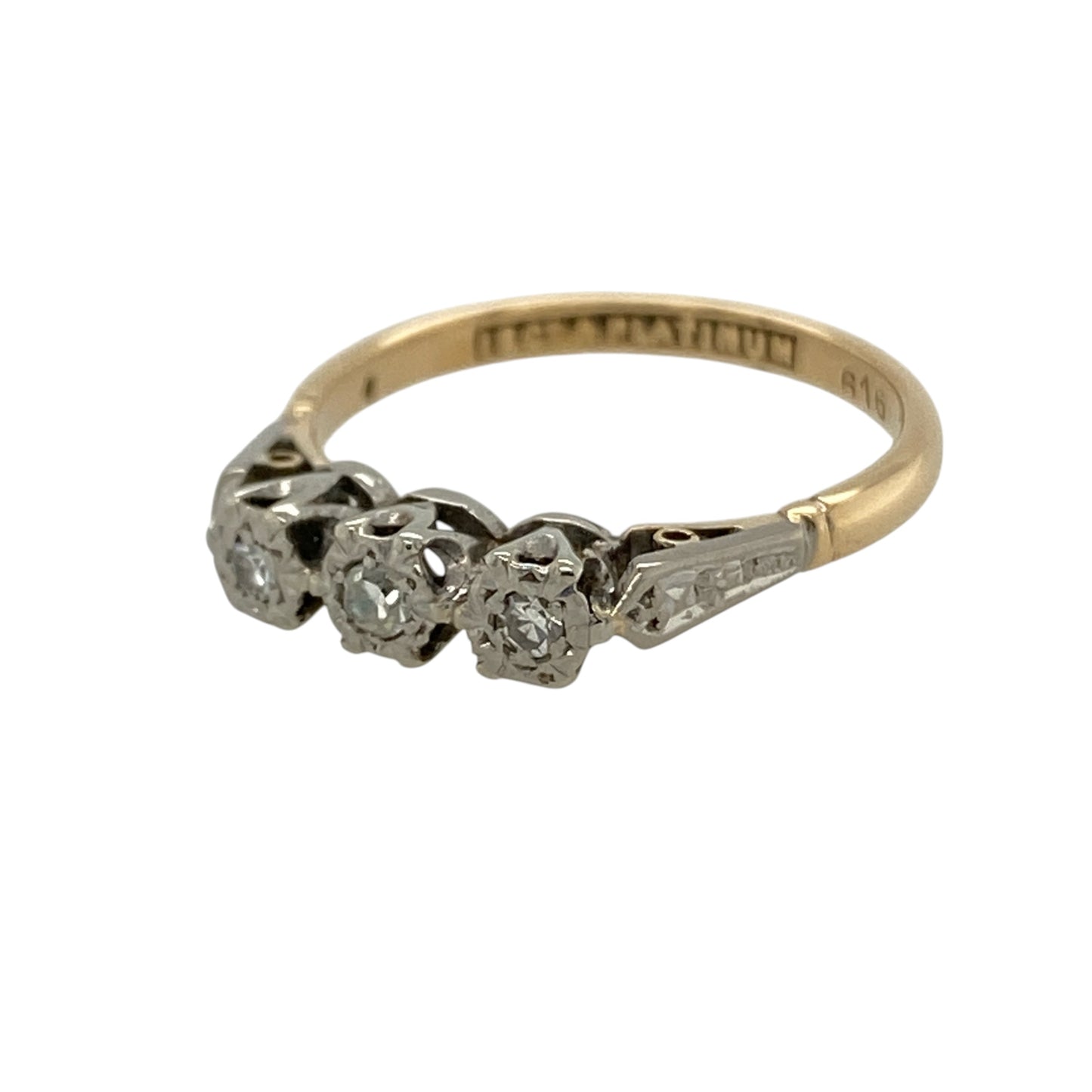 This pre-owned 18ct yellow gold and platinum diamond trilogy ring is a timeless two-tone design, featuring three diamonds in a classic setting.

Design: Featuring three diamonds set alongside one another in a classic trilogy design, this ring combines warm 18ct yellow gold with contrasting platinum detailing.
Material: Made from 18-carat yellow gold and platinum.
Gemstone Detail: Set with three diamonds.
Ring Detail: Classic three-stone trilogy ring design.