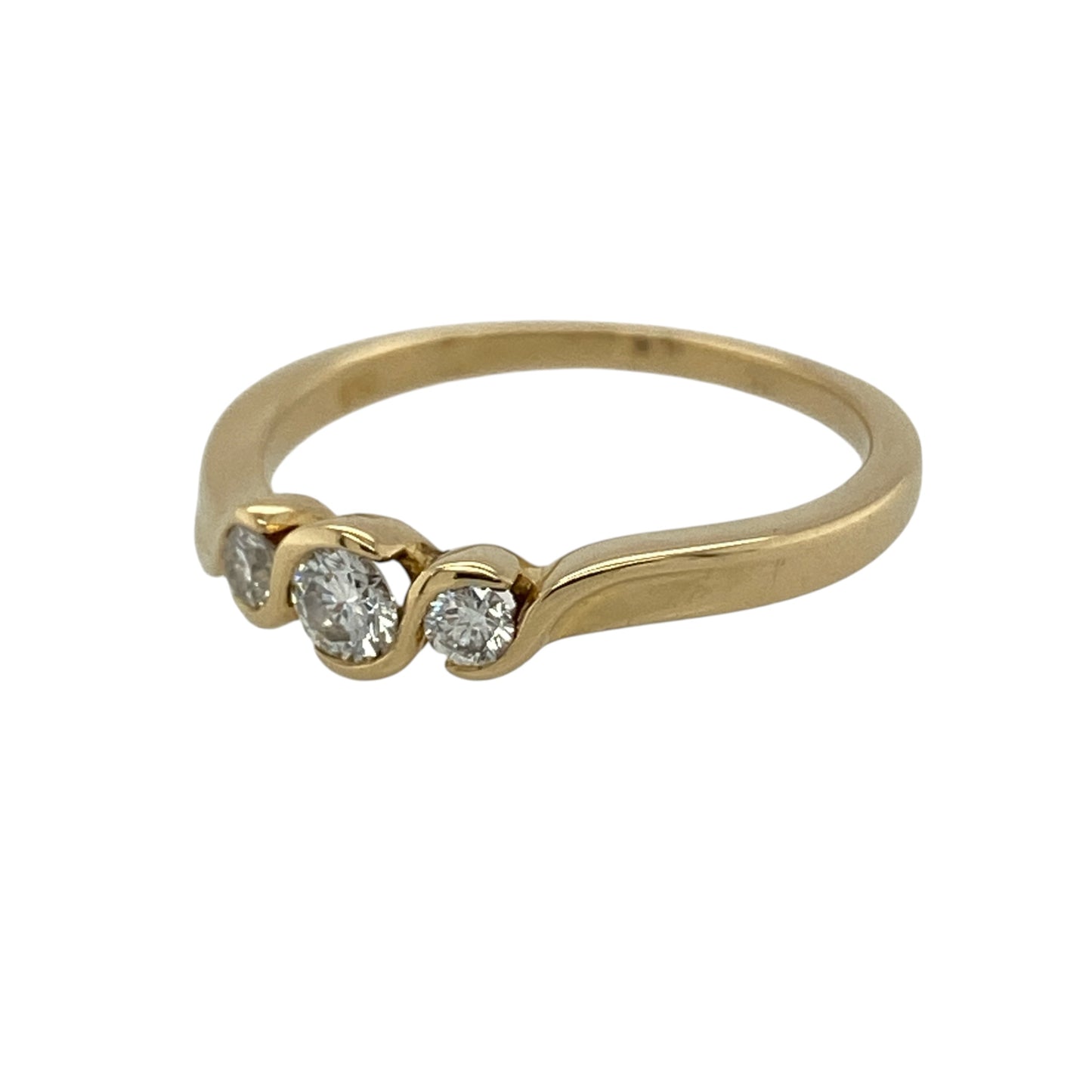 This pre-owned 18ct yellow gold diamond twist trilogy ring is a timeless design, featuring three diamonds within a flowing twist-style setting.

Design: Featuring three diamonds set within a twist-style trilogy design, this ring has a flowing profile finished in warm 18ct yellow gold.
Material: Made from 18-carat yellow gold.
Gemstone Detail: Set with three diamonds.
Ring Detail: Three-stone twist trilogy ring design.
Size & Weight: Ring size M. Total weight 2.80 grams.