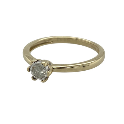 This pre-owned 9ct yellow gold diamond illusion-set solitaire ring is a classic two-tone design, featuring a brilliant cut diamond within a white gold illusion setting.

Design: Featuring a brilliant cut diamond in a white gold illusion setting, this solitaire ring combines warm yellow gold with contrasting white gold detailing.
Material: Made from 9-carat yellow gold with a white gold illusion setting.
Gemstone Detail: Brilliant cut diamond measuring approximately 0.15ct.