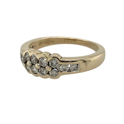 This pre-owned 9ct yellow gold diamond double row band ring is a classic stone-set design, featuring two rows of diamond detailing across the front.

Design: Featuring a double row of diamonds across the front of the band, this ring has a bold stone-set design finished in warm 9ct yellow gold.
Material: Made from 9-carat yellow gold.
Gemstone Detail: Set with two rows of diamonds.
Ring Detail: Front of the band measures approximately 6mm wide.
Size & Weight: Ring size M to N. Total weight 3.40 grams.