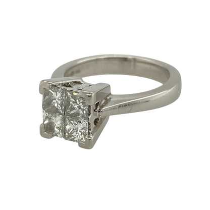 This pre-owned platinum diamond illusion-set solitaire ring is a striking design, featuring four princess cut diamonds arranged together to create the appearance of a larger single stone.

Design: Featuring four princess cut diamonds set closely together in an illusion-style solitaire setting, this ring creates the appearance of a larger centre stone and is finished in platinum.
Material: Made from platinum.
Gemstone Detail: Four princess cut.