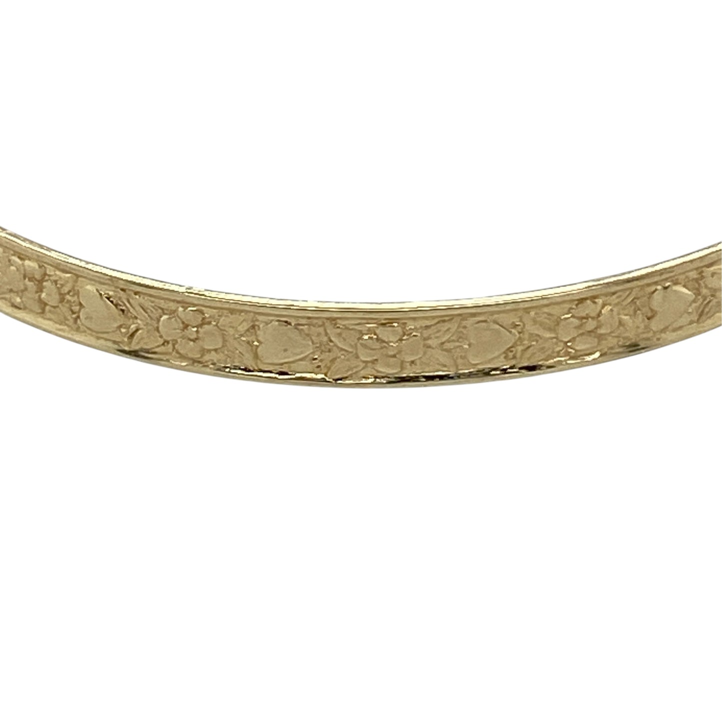 This pre-owned 9ct yellow gold flower and heart patterned expanding bangle is a decorative design, featuring a combination of floral and heart detailing.

Design: Featuring flower and heart patterned detailing, this expanding bangle has a decorative finish in warm 9ct yellow gold.
Material: Made from 9-carat yellow gold.
Bangle Detail: Expanding bangle measuring approximately 3mm wide, with a diameter of approximately 3.5cm when closed and 4.5cm when fully expanded.
Size & Weight: Total weight 1.90 grams.