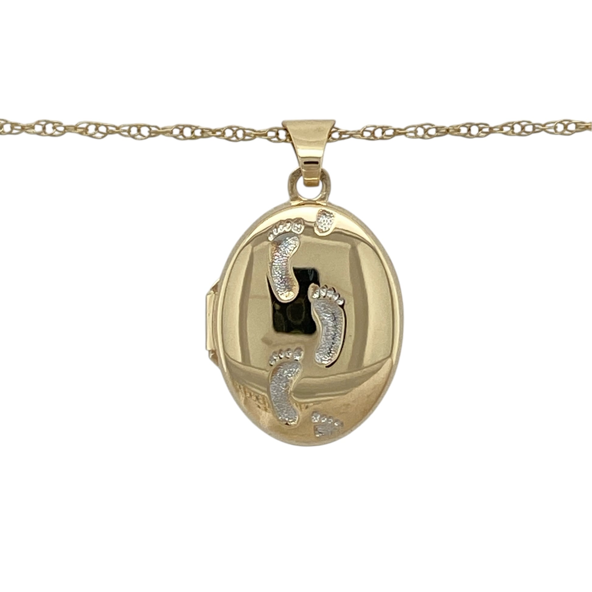 This pre-owned 9ct yellow and white gold footprint oval locket necklace is a meaningful design, featuring footprint detailing and a sentimental message on the reverse.

Design: Featuring an oval locket with footprint detailing, this necklace combines warm yellow gold with contrasting white gold and is suspended from a 19-inch Prince of Wales chain.
Material: Made from 9-carat yellow and white gold.
Locket Detail: Oval footprint locket measuring approximately 2.4cm long including the bail.