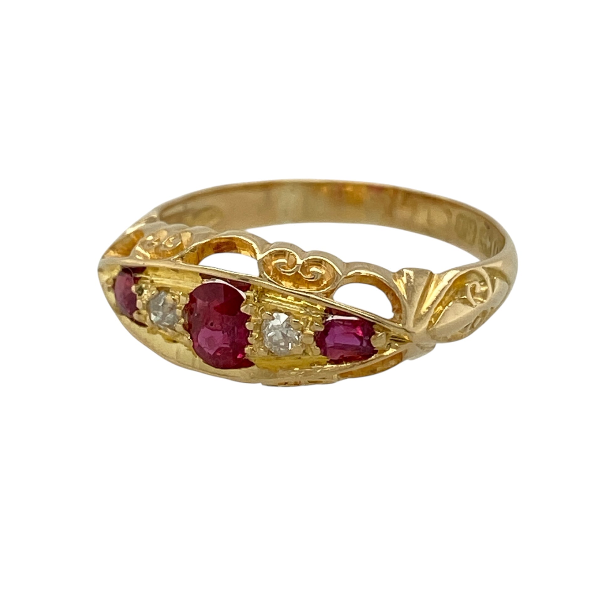 This pre-owned 18ct yellow gold diamond and ruby vintage boat-style ring is a traditional gemstone design, featuring alternating rubies and diamonds across the front.

Design: Featuring a vintage boat-style setting with an oval ruby at the centre, flanked by a diamond and further ruby on either side, this ring is finished in warm 18ct yellow gold.
Material: Made from 18-carat yellow gold.