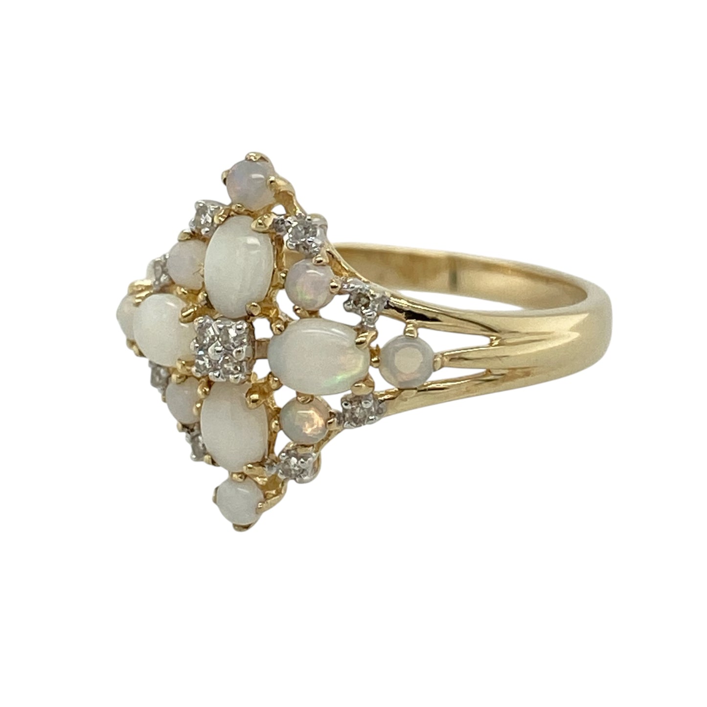 This pre-owned 9ct yellow gold diamond and opalique flower-style cluster ring is a decorative gemstone design, featuring a floral-inspired cluster setting.

Design: Featuring a flower-style cluster design set with opalique and diamond detailing, this ring has a decorative floral appearance finished in warm 9ct yellow gold.
Material: Made from 9-carat yellow gold.
Gemstone Detail: Set with opalique stones and diamond detailing in a flower-style cluster arrangement.