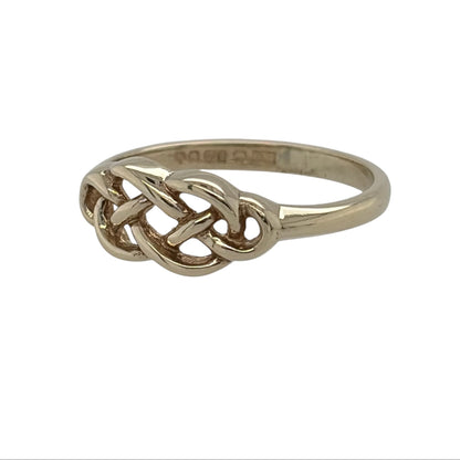 This pre-owned 9ct yellow gold Celtic Knot ring is a distinctive design, featuring traditional interwoven Celtic-inspired detailing.

Design: Featuring a traditional Celtic Knot pattern across the front, this ring has a decorative interwoven design finished in warm 9ct yellow gold.
Material: Made from 9-carat yellow gold.
Ring Detail: Celtic Knot design measures approximately 6mm high across the front.
Size & Weight: Ring size J to K. Total weight 1.60 grams.