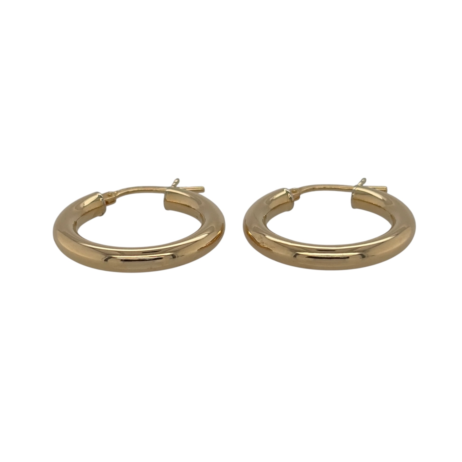 These pre-owned 9ct yellow gold plain hoop creole earrings are a classic and versatile design, perfect for everyday wear.

Design: Featuring a traditional plain hoop creole design, these earrings have a simple polished finish in warm 9ct yellow gold.
Material: Made from 9-carat yellow gold.
Earring Detail: Plain hoop creole earring design.
Size & Weight: Total weight 2.40 grams.
