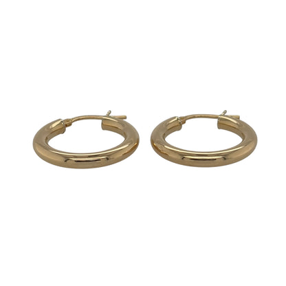 These pre-owned 9ct yellow gold plain hoop creole earrings are a classic and versatile design, perfect for everyday wear.

Design: Featuring a traditional plain hoop creole design, these earrings have a simple polished finish in warm 9ct yellow gold.
Material: Made from 9-carat yellow gold.
Earring Detail: Plain hoop creole earring design.
Size & Weight: Total weight 2.40 grams.