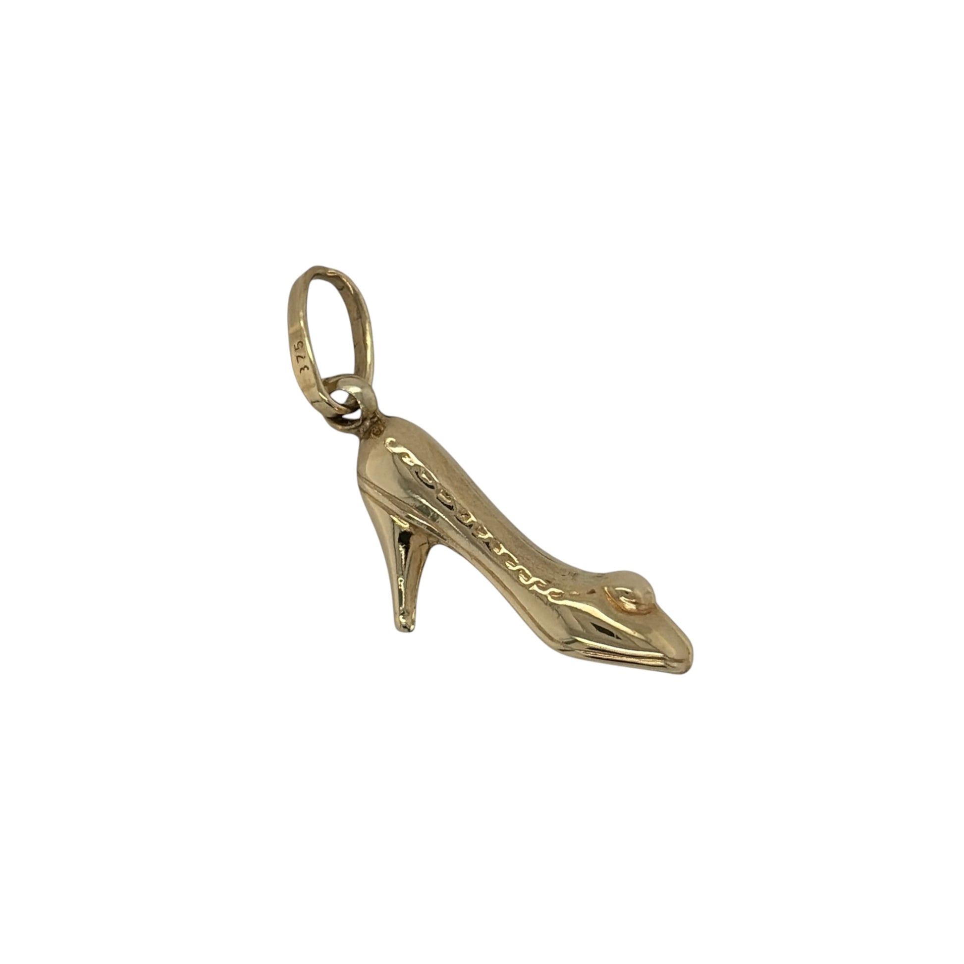 This pre-owned 9ct yellow gold heeled shoe pendant is a fun and distinctive design, featuring a detailed high heel shoe motif.

Design: Featuring a decorative heeled shoe design, this pendant has a distinctive novelty finish in warm 9ct yellow gold.
Material: Made from 9-carat yellow gold.
Pendant Detail: Heeled shoe pendant with a bail measuring approximately 6mm by 4mm.
Size & Weight: Total weight 0.80 grams.