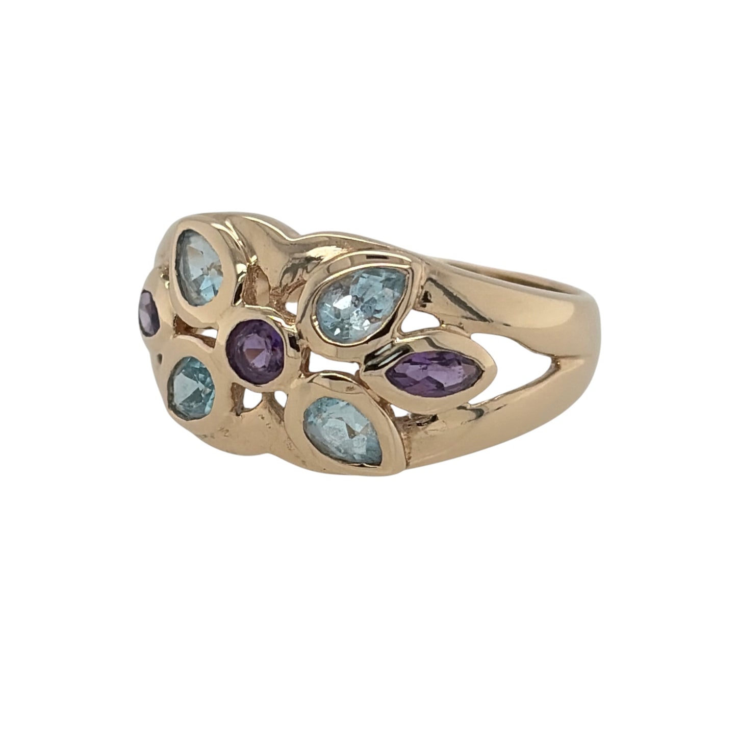 This pre-owned 9ct yellow gold blue topaz and amethyst flower ring is a colourful dress ring, featuring contrasting gemstones arranged in a decorative floral design.

Design: Featuring a flower-shaped design, this ring combines blue topaz and amethyst stones to create a colourful floral centrepiece in warm 9ct yellow gold.
Material: Made from 9-carat yellow gold.
Gemstone Detail: Set with blue topaz and amethyst stones arranged in a flower-style design.