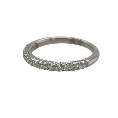 This pre-owned 18ct white gold diamond three row band ring is a classic design, featuring three rounded rows with diamond detailing across the front.

Design: Featuring a three row rounded design, this ring has diamond detailing set across the front for a distinctive layered appearance in 18ct white gold.
Material: Made from 18-carat white gold.
Gemstone Detail: Set with diamonds across the three row design.
Ring Detail: The front of the band measures approximately 2mm wide.