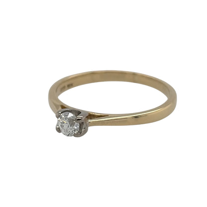 This pre-owned 18ct yellow gold diamond solitaire ring is a timeless design, featuring a brilliant cut diamond as the centrepiece.

Design: Featuring a classic solitaire design, this ring showcases a single brilliant cut diamond set against warm 18ct yellow gold.
Material: Made from 18-carat yellow gold.
Gemstone Detail: Set with a single brilliant cut diamond as the centre stone.
Ring Detail: Classic solitaire setting designed to showcase the brilliant cut diamond.