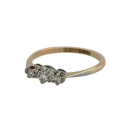 This pre-owned 18ct yellow gold and platinum diamond trilogy ring is a timeless two-tone design, featuring three diamonds set across the front of the ring.

Design: Featuring a classic trilogy design, this ring combines warm 18ct yellow gold with platinum detailing for a traditional two-tone finish.
Material: Made from 18-carat yellow gold and platinum.
Gemstone Detail: Set with three diamonds in a traditional trilogy arrangement.