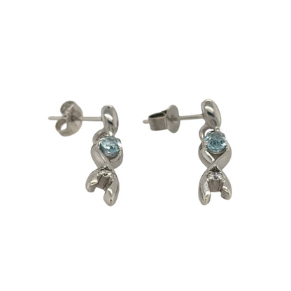 This pre-owned 9ct white gold diamond and aqua drop earrings are an elegant design, featuring teardrop-shaped aqua stones complemented by diamond detailing.

Design: Featuring a classic drop design, these earrings combine teardrop-shaped aqua stones with diamond detailing in 9ct white gold.
Material: Made from 9-carat white gold.
Gemstone Detail: Set with teardrop-shaped aqua stones measuring approximately 5mm by 3mm each, complemented by diamond detailing.
