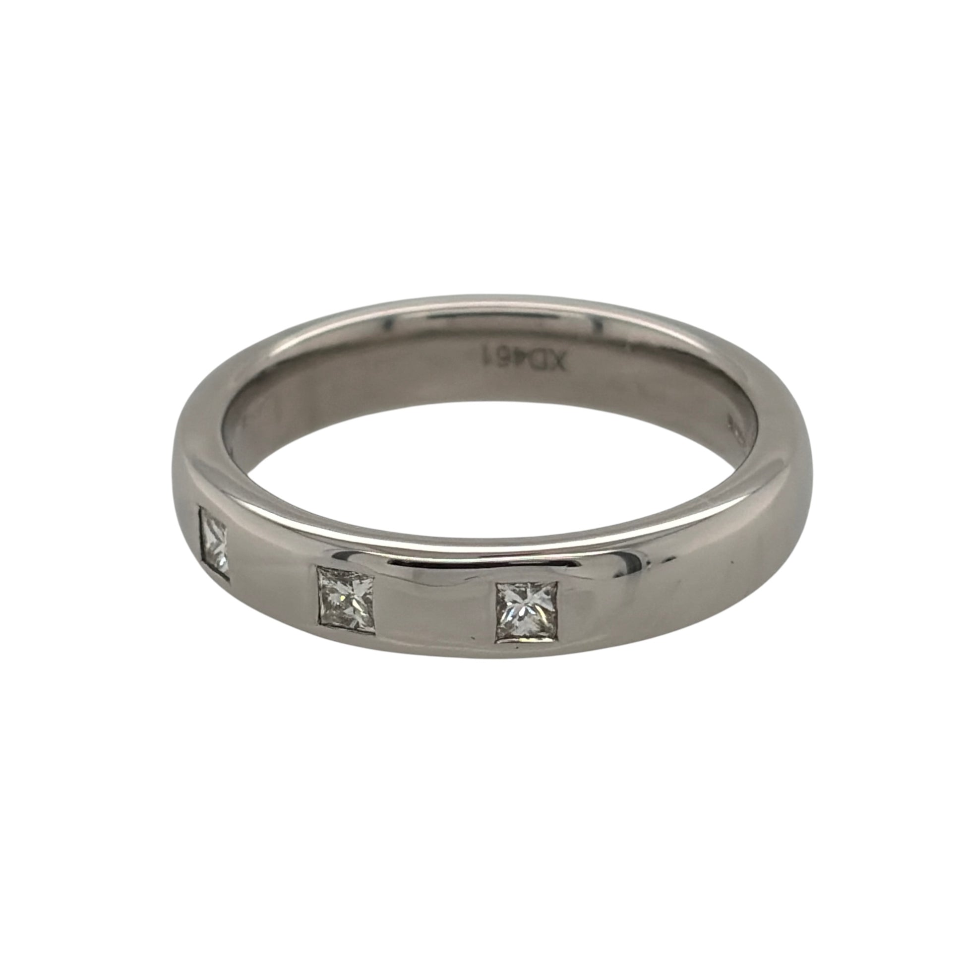 This pre-owned 9ct white gold diamond band ring is a classic design, featuring four princess cut diamonds set across the band.

Design: Featuring a simple band design, this ring has four princess cut diamonds set across the front for a clean geometric appearance.
Material: Made from 9-carat white gold.
Gemstone Detail: Set with four princess cut diamonds across the band.
Ring Detail: Band measures approximately 4mm wide.
Size & Weight: Ring size L to M. Total weight 4.80 grams.