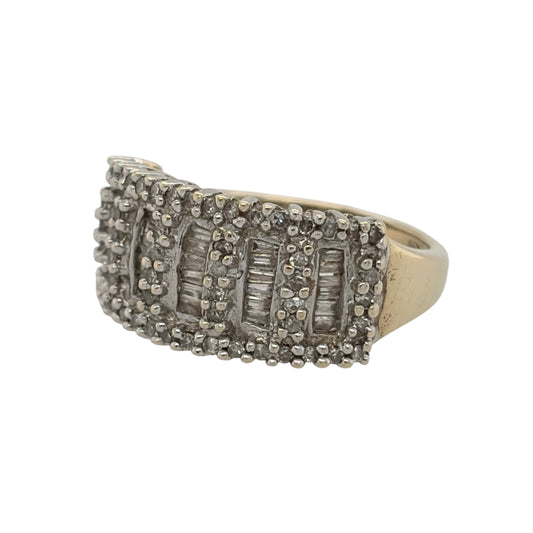 This pre-owned 9ct yellow gold diamond cluster wide band ring is a bold design, featuring a combination of baguette and brilliant cut diamonds across the front.

Design: Featuring a wide cluster-style band design, this ring combines baguette and brilliant cut diamonds for a distinctive multi-cut appearance in warm 9ct yellow gold.
Material: Made from 9-carat yellow gold.
Gemstone Detail: Set with a combination of baguette cut and brilliant cut diamonds across the front of the ring.