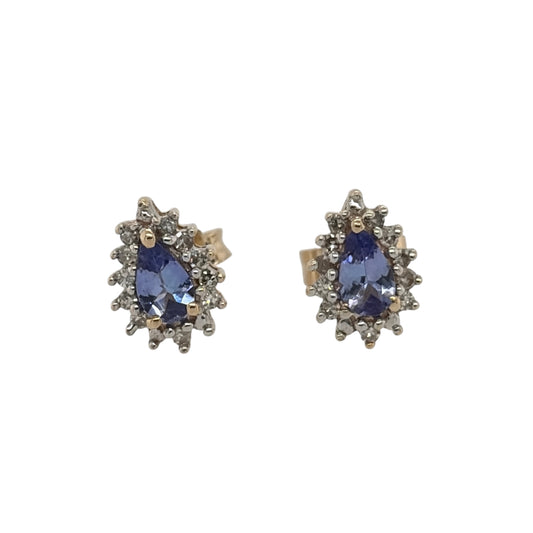This pre-owned 9ct yellow gold diamond and tanzanite teardrop cluster stud earrings are a classic gemstone design, featuring teardrop-shaped tanzanites complemented by diamond detailing.

Design: Featuring a teardrop cluster design, these stud earrings showcase tanzanite centre stones surrounded by diamond detailing in warm 9ct yellow gold.
Material: Made from 9-carat yellow gold.