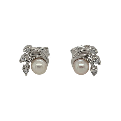 New 9ct White Gold Pearl &amp; Cubic Zirconia Fan Stud Earrings with the weight 1.60 grams and the face of the studs are 7mm by 5mm
