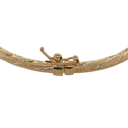 New 9ct Yellow Gold Textured Twist Bangle with the weight 2.80 grams and diameter 6.5cm