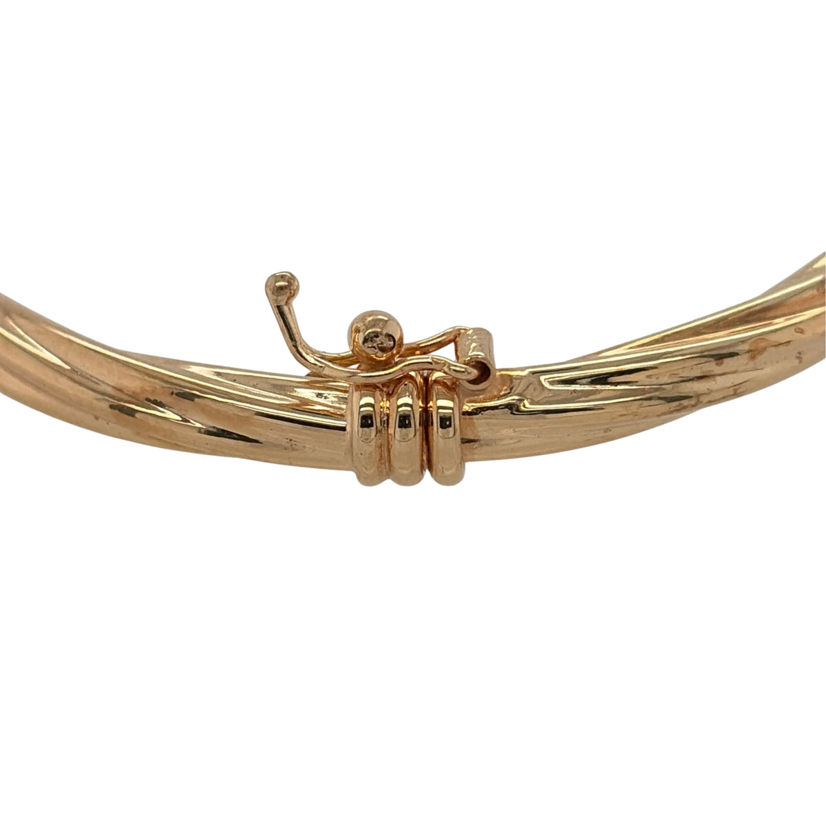 New 9ct Yellow Gold Twisted Hinged Bangle with the weight 4.40 grams and diameter 6.5cm. The bangle width is approx 4mm