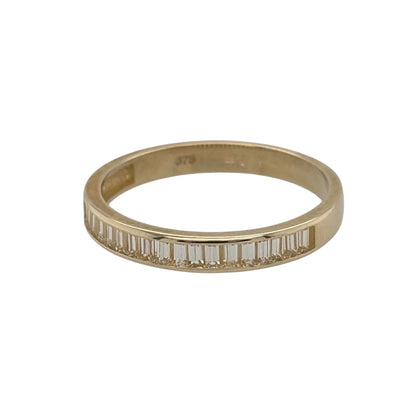 New 9ct Yellow Gold &amp; baguette cut Cubic Zirconia Band Ring in various sizes with the approximate weight 1.50 grams. The front of the band is 3mm wide