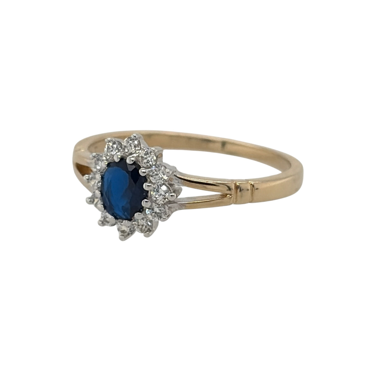 New 9ct Yellow Gold Sapphire coloured blue stone &amp; Cubic Zirconia Cluster Ring in various sizes with the approximate weight 1.60 grams. The center blue stone is 5mm by 4mm