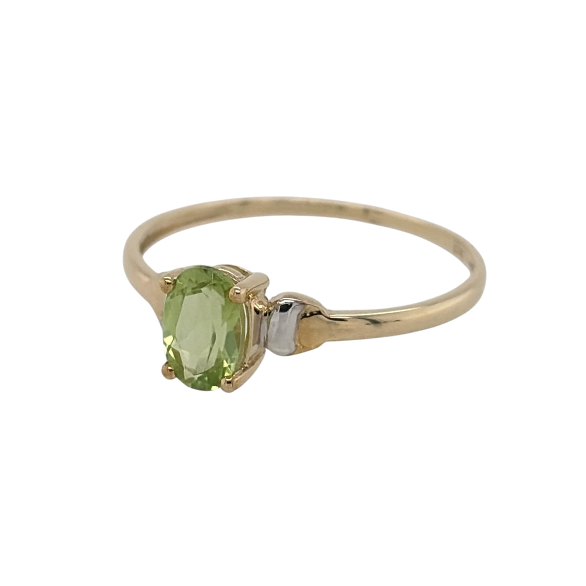 New 9ct Yellow and White Gold &amp; Peridot Ring in various sizes with the approximate weight 0.90 grams. The peridot stone is 6mm by 4mm