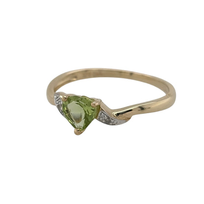 New 9ct Yellow Gold Diamond &amp; Peridot Heart Ring in various sizes with the approx weight 1.50 grams. The heart peridot stone is 5mm by 5mm and the 0.01ct of diamonds are approximate clarity i2-i3 and colour H - I
