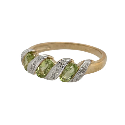 New 9ct Yellow Gold Diamond &amp; Peridot Twist Band Ring in various sizes with the approx weight 2.20 grams. The three oval peridot stones are 5mm by 3mm and the 0.02ct of diamond content has approximate clarity i2-i3 and colour H - I