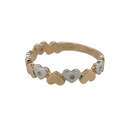 New 9ct Yellow and White Gold &amp; Diamond Heart Band Ring in various sizes with the approx weight 2 grams. There is 0.15ct of diamond content in the ring has approximate clarity i2-i3 and colour H - I