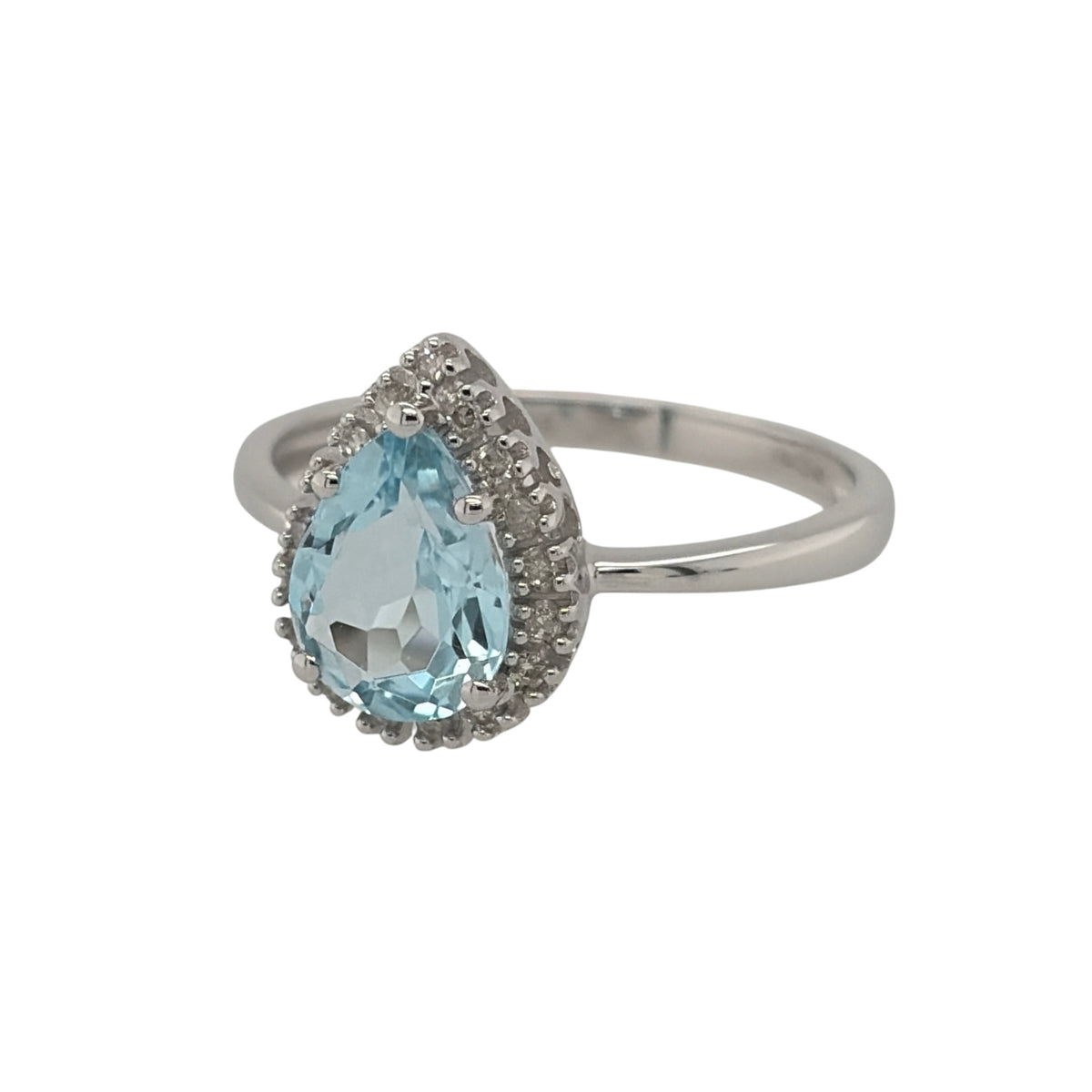 New 9ct White Gold Diamond &amp; Blue Topaz Teardrop Halo Ring in various sizes with the approx weight 2.40 grams. There is approximatley 0.12ct of diamond content in the ring has approximate clarity i2-i3 and colour H - I. The teardrop cut blue topaz stone is 8mm by 6mm