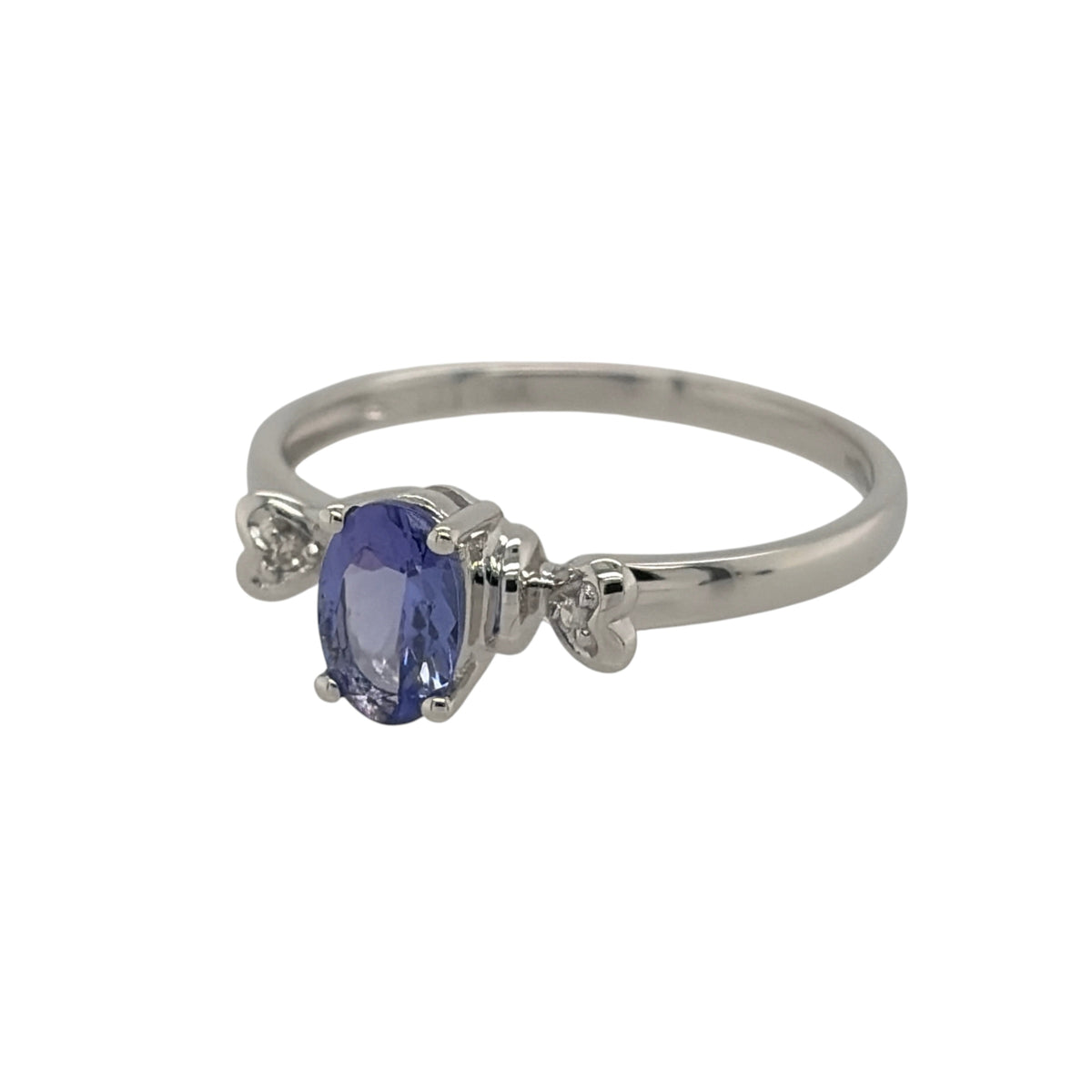 New 9ct White Gold Diamond &amp; Tanzanite Ring in various sizes with the approx weight 1.10 grams. There is approximatley 0.02ct of diamond content in the ring has approximate clarity i2-i3 and colour H - I. The oval tanzanite stone is 6mm by 4mm